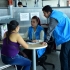 Funcionarios SDP atendiendo a una ciudadana en el SuperCADE